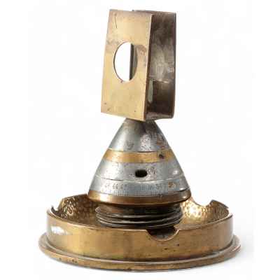 Пепельница и спичечница из австрийского снаряда с серебряной монетой 20 Сентимо 1921 г. Италия около 1921 г