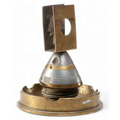 Пепельница и спичечница из австрийского снаряда с серебряной монетой 20 Сентимо 1921 г. Италия около 1921 г